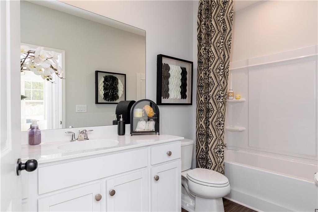 3260 Croftside Commons Powder Springs, GA 30127 - Photo 39 of 64 a bathroom with a sink toilet and shower