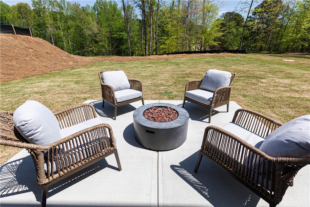 3260 Croftside Commons Powder Springs, GA 30127 - Photo 48 of 64 a view of a chairs and table on the roof deck