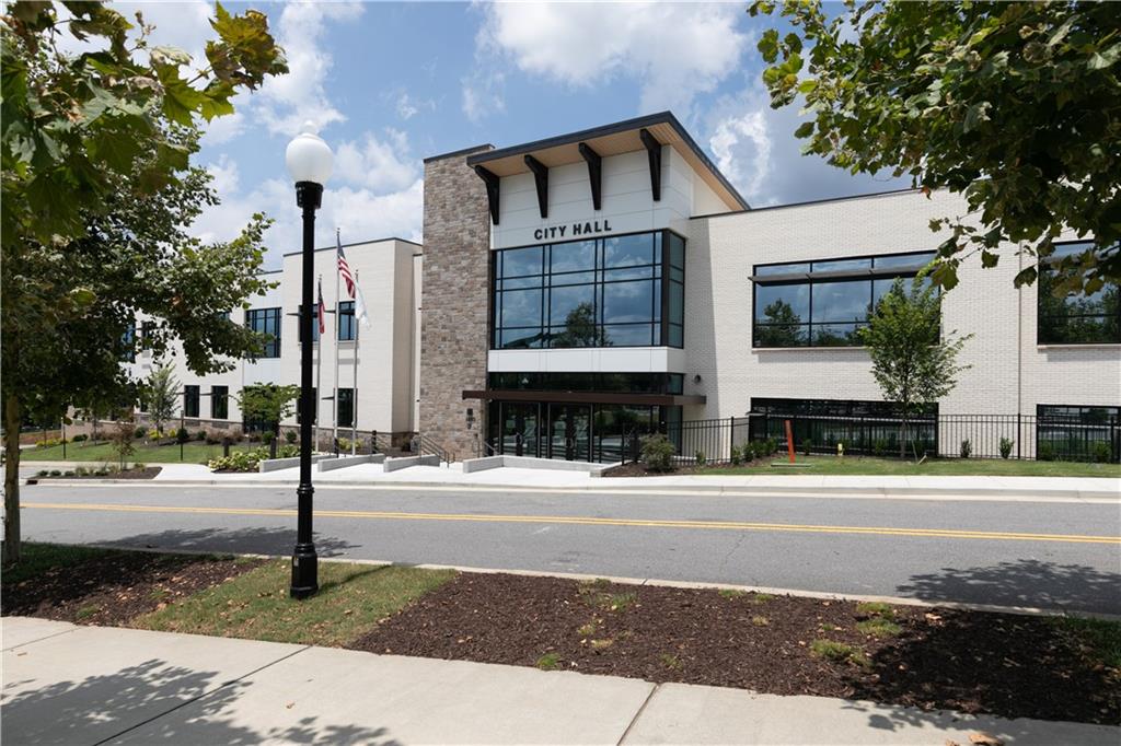3260 Croftside Commons Powder Springs, GA 30127 - Photo 63 of 64 a front view of a building with street