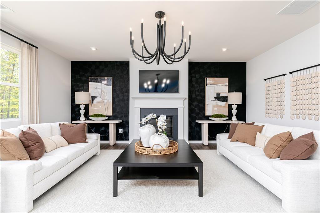3260 Croftside Commons Powder Springs, GA 30127 - Photo 9 of 64 a living room with furniture and a large window