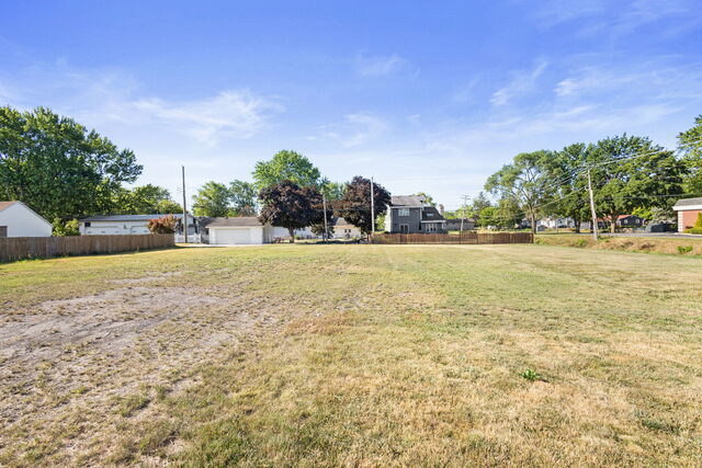 652 Penfield Street Beecher, IL 60401 - Photo 1 of 16 a view of a swimming pool and an outdoor space