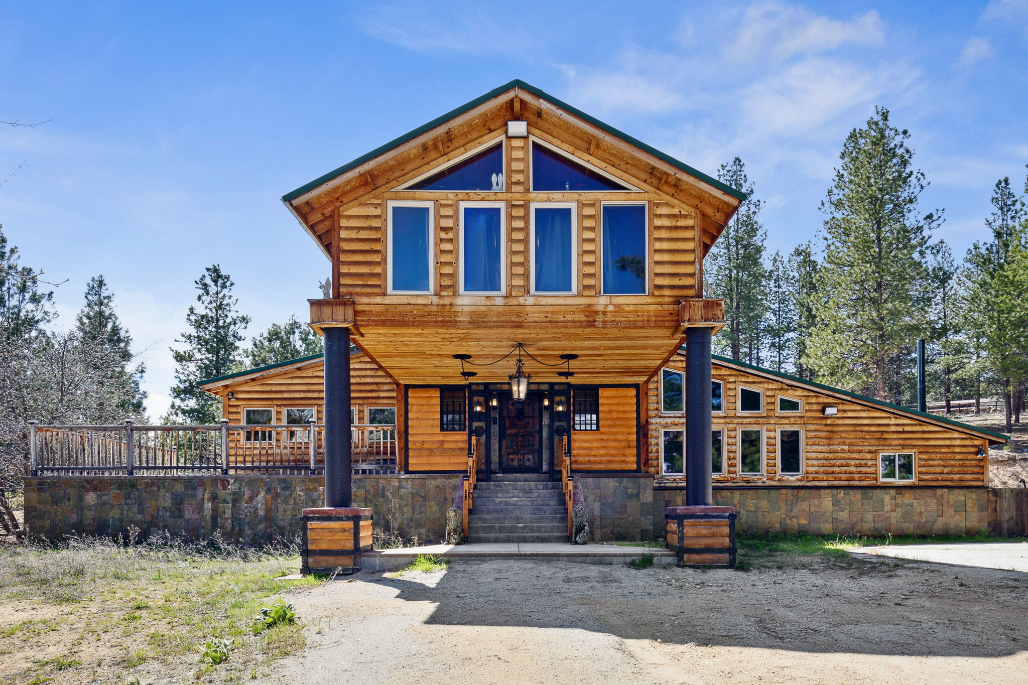435 Hayes Creek Road Hamilton, MT 59840 - Photo 1 of 1 Log cabin with a porch