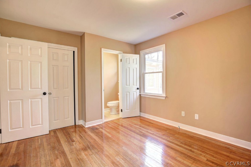 6600 Rock Run Road Chesterfield, VA 23832 - Photo 19 of 24 a view of an empty room with wooden floor and a window