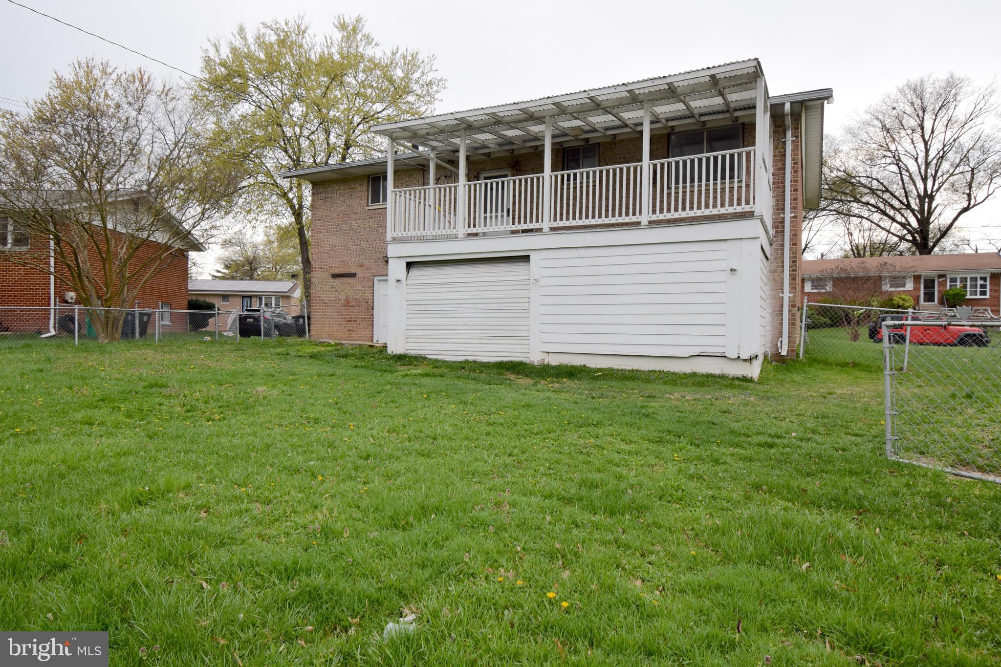 14017 Adkins Road Laurel, MD 20708 - Photo 19 of 19 a view of a house with a yard