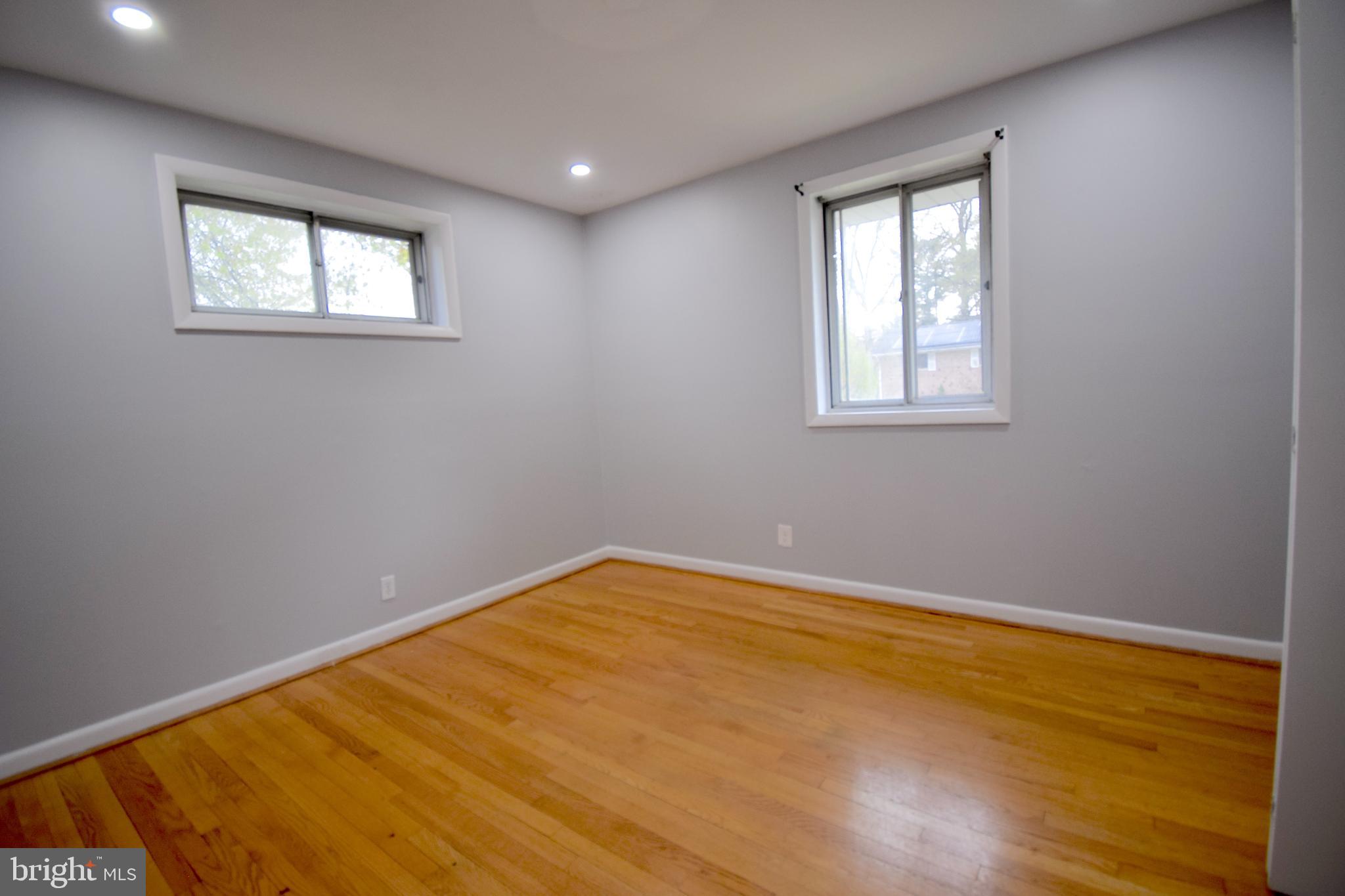 14017 Adkins Road Laurel, MD 20708 - Photo 4 of 19 an empty room with a window