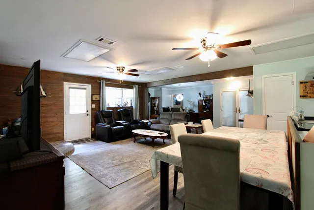 a room with furniture and wooden floor