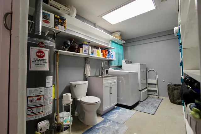 a living room with furniture a rug and a window