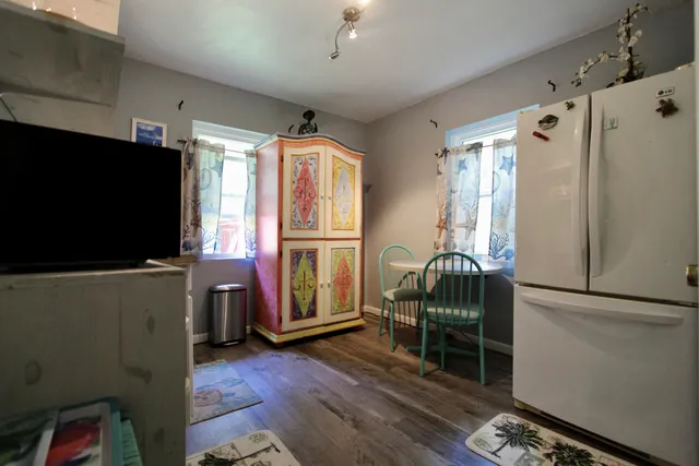 a bed room with a bed and a book shelf