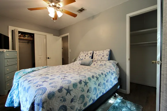 a living room with furniture fireplace and a table