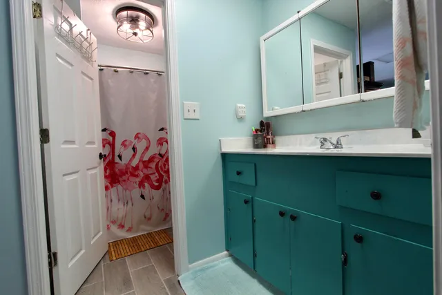 a view of hallway with livingroom and furniture