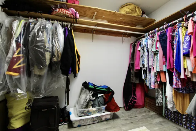 a view of a house with backyard patio and garden