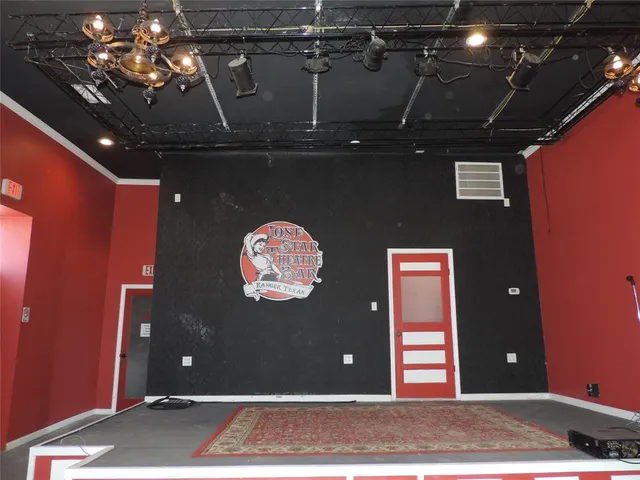 a view of a hallway with a chandelier