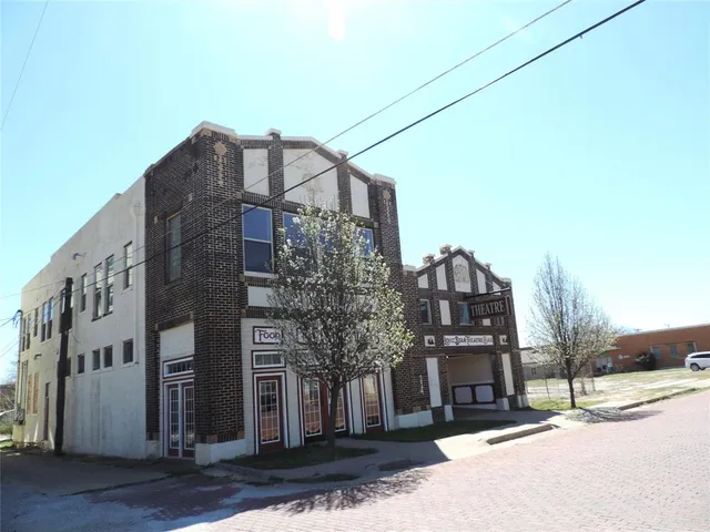 a view of a building and a street