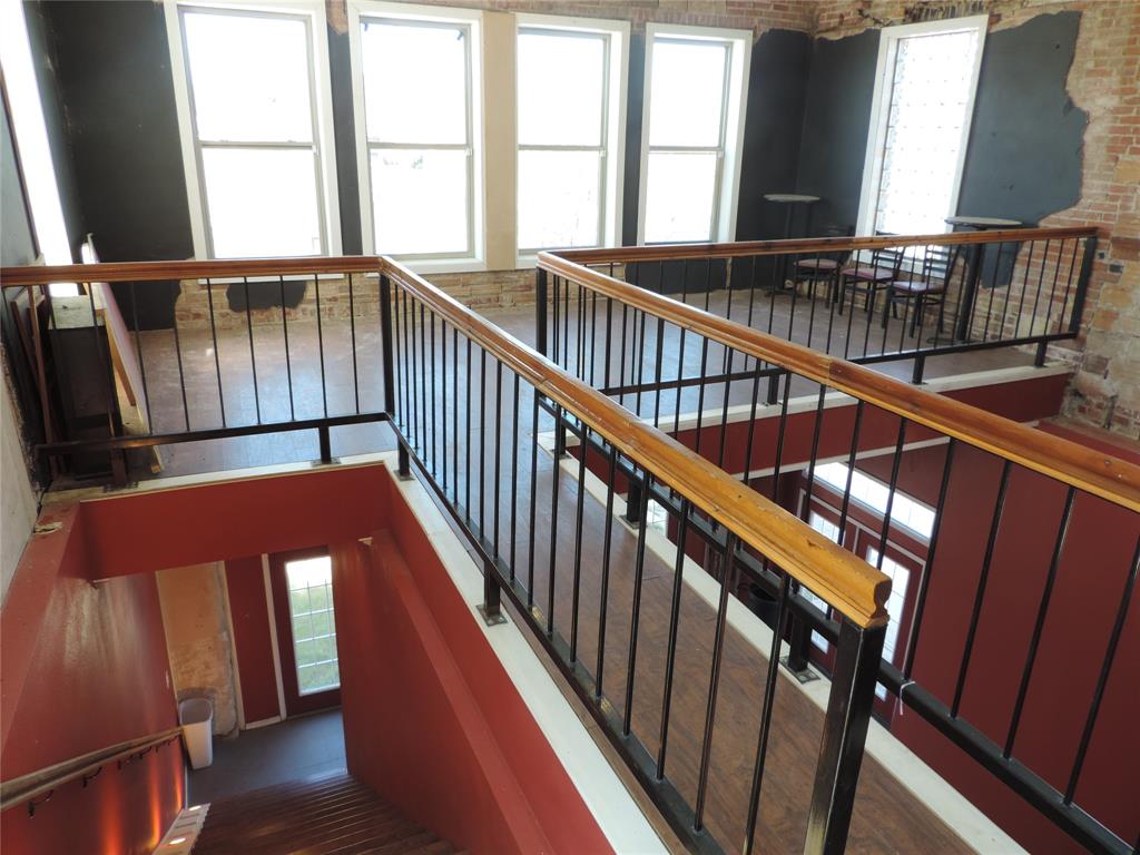 112 South Austin Street Ranger, TX 76470 - Photo 21 of 40 a view of balcony with wooden floor