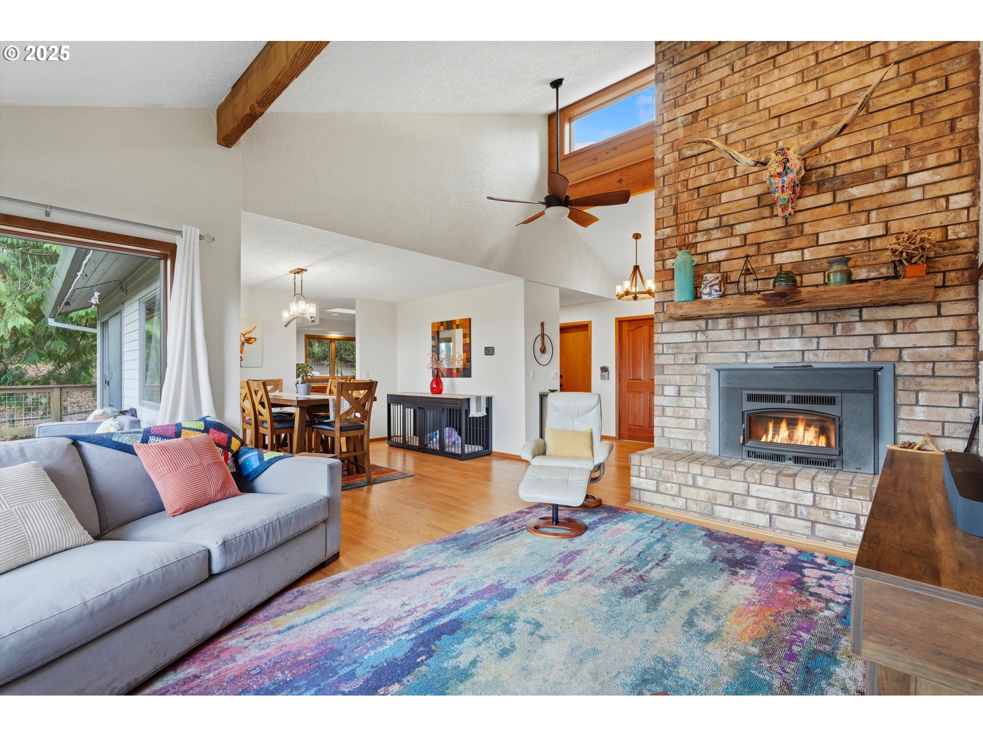 21645 Southwest McCormick Hill Road Hillsboro, OR 97123 - Photo 9 of 47 a living room with furniture and a fireplace