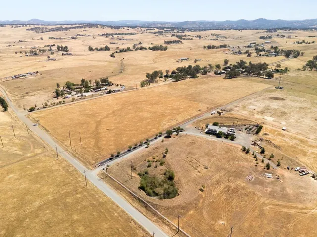 an aerial view of ocean and beach