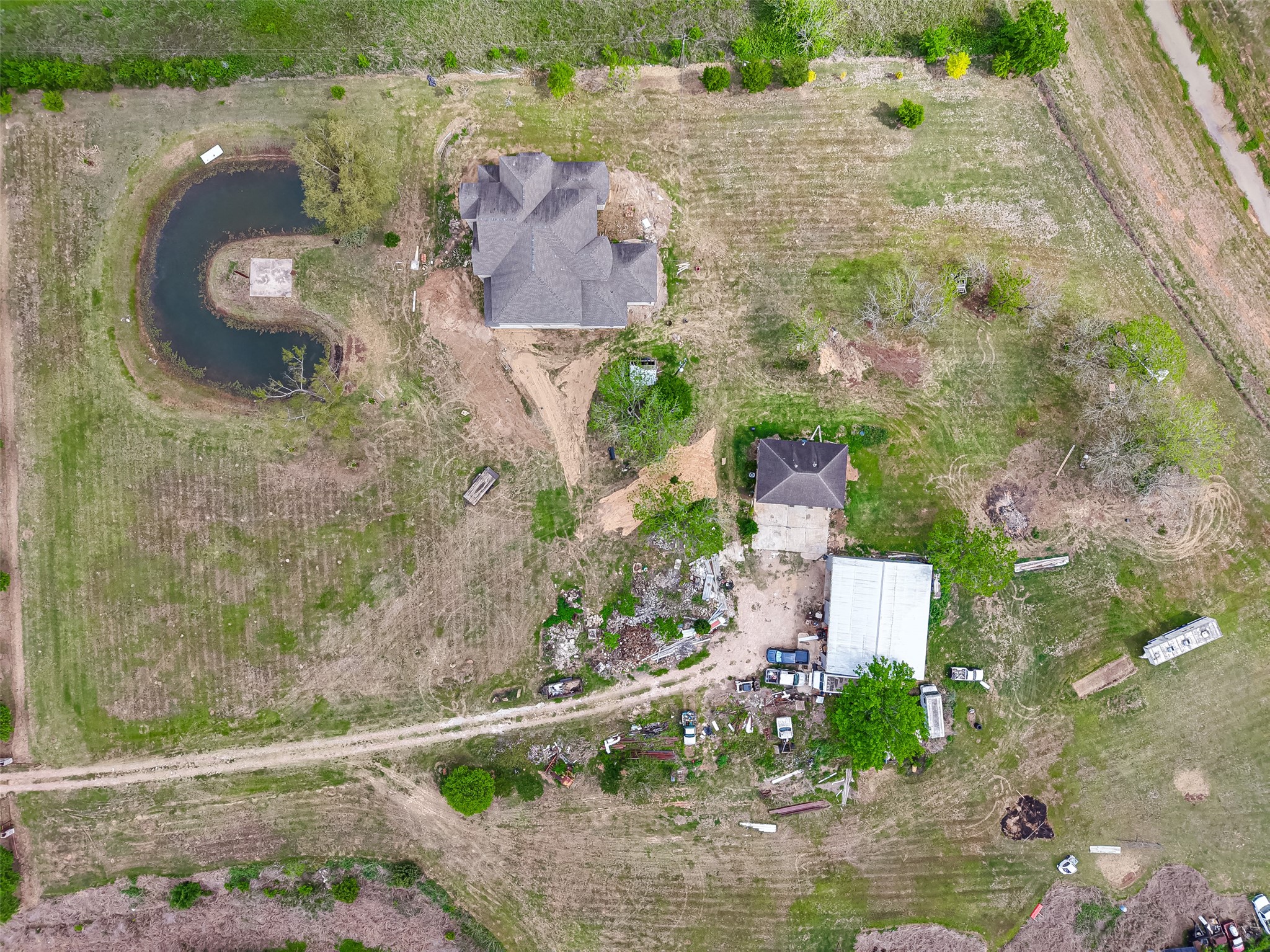 8023 Pool Hill Road Fulshear, TX 77441 - Photo 47 of 50 an aerial view of a house with outdoor space