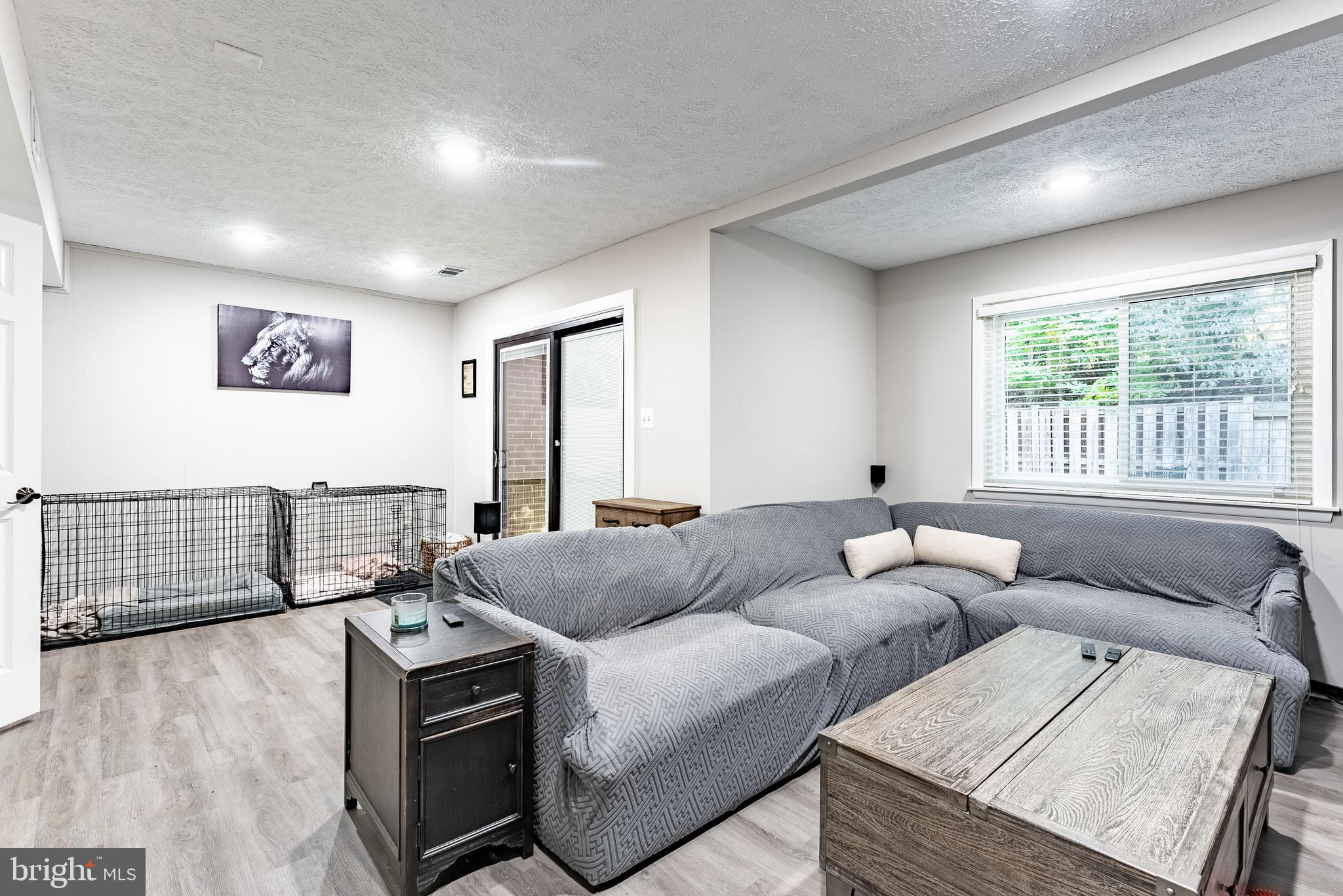 2045 Winged Foot Court Reston, VA 20191 - Photo 14 of 39 a living room with furniture and a window