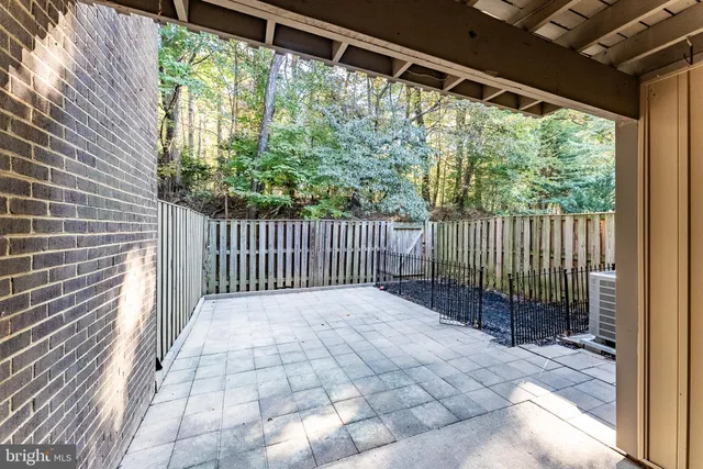 a view of backyard with green space