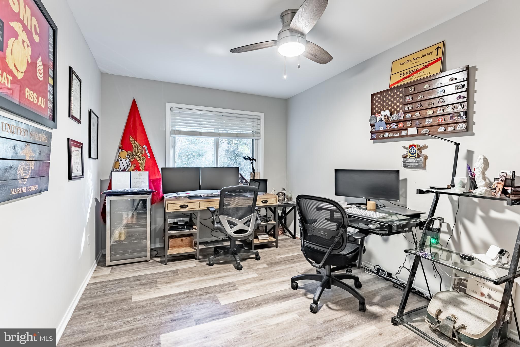 2045 Winged Foot Court Reston, VA 20191 - Photo 32 of 39 a view of a workspace with furniture and a window
