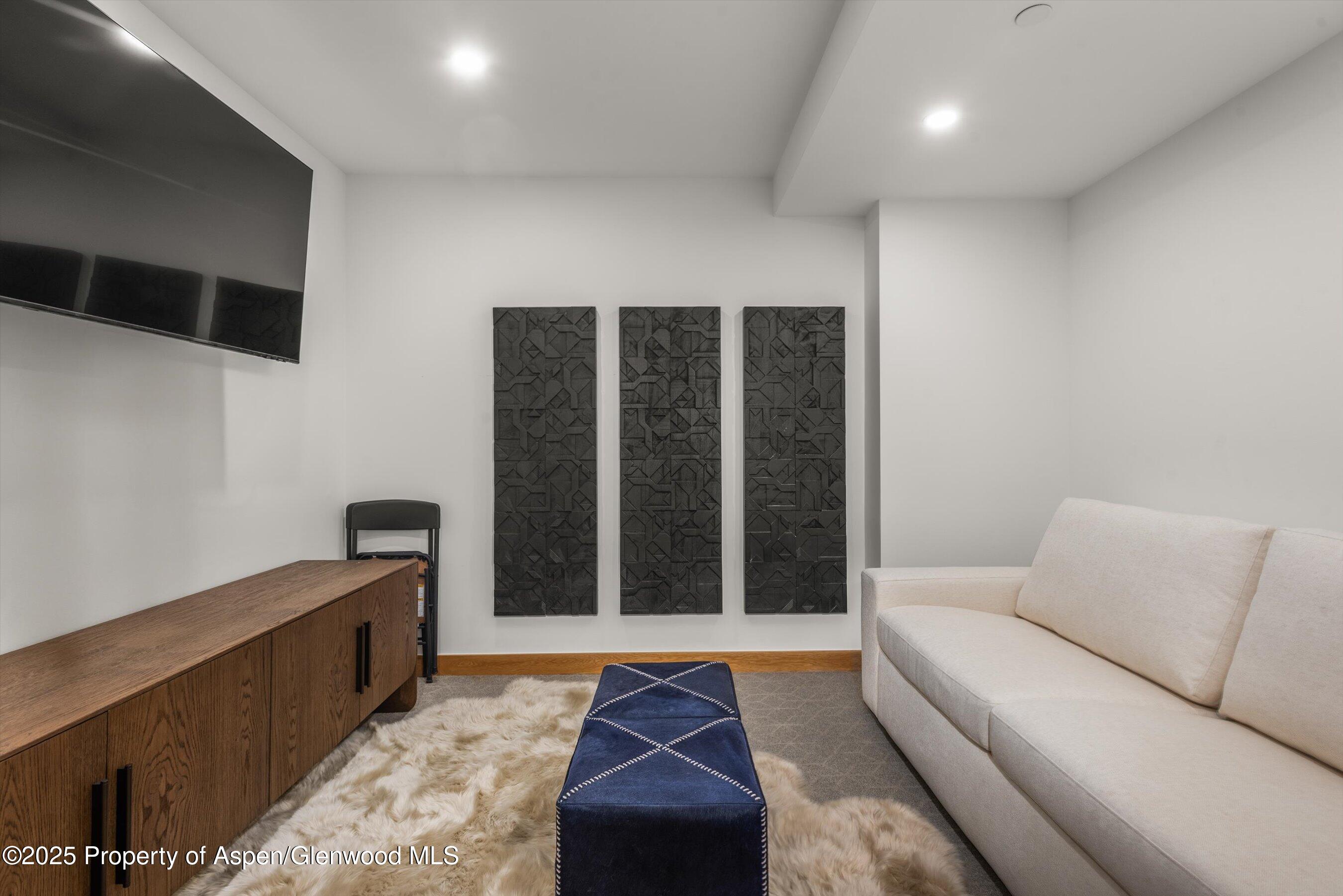 130 Wood Road, Unit 625 Snowmass Village, CO 81615 - Photo 12 of 15 a living room with furniture