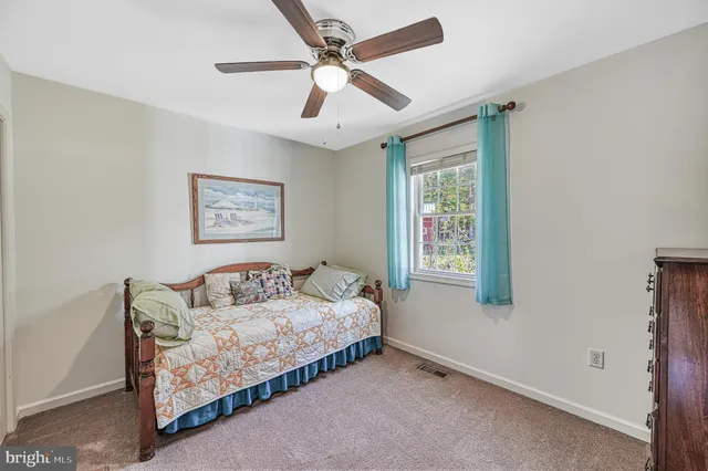 a bedroom with a bed and a cabinets