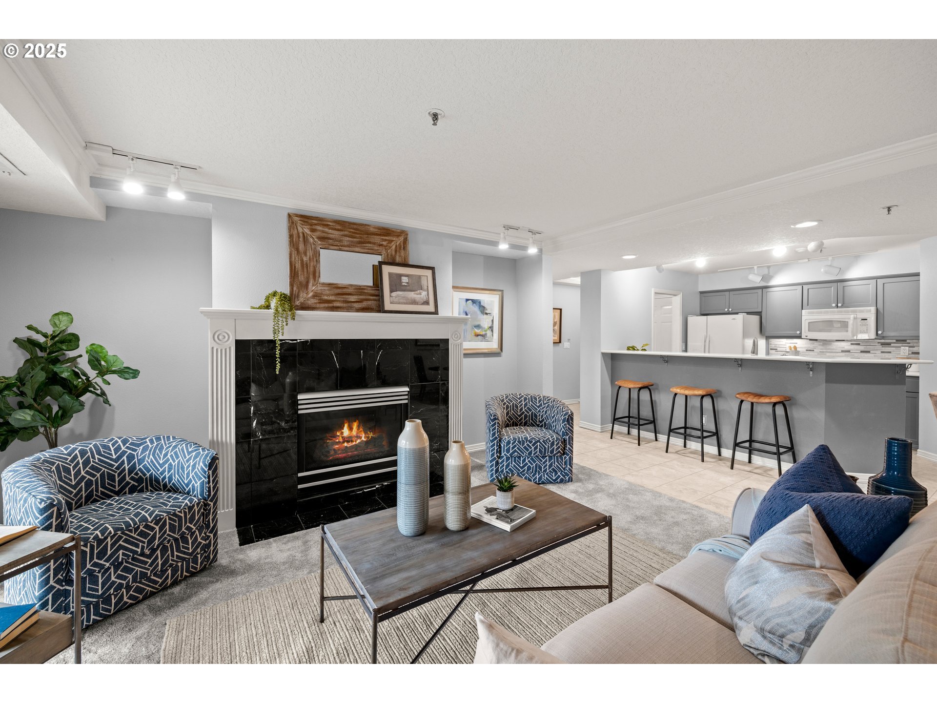 15420 Northeast Knott Street, Unit 2 Portland, OR 97230 - Photo 5 of 30 a living room with furniture and a fireplace