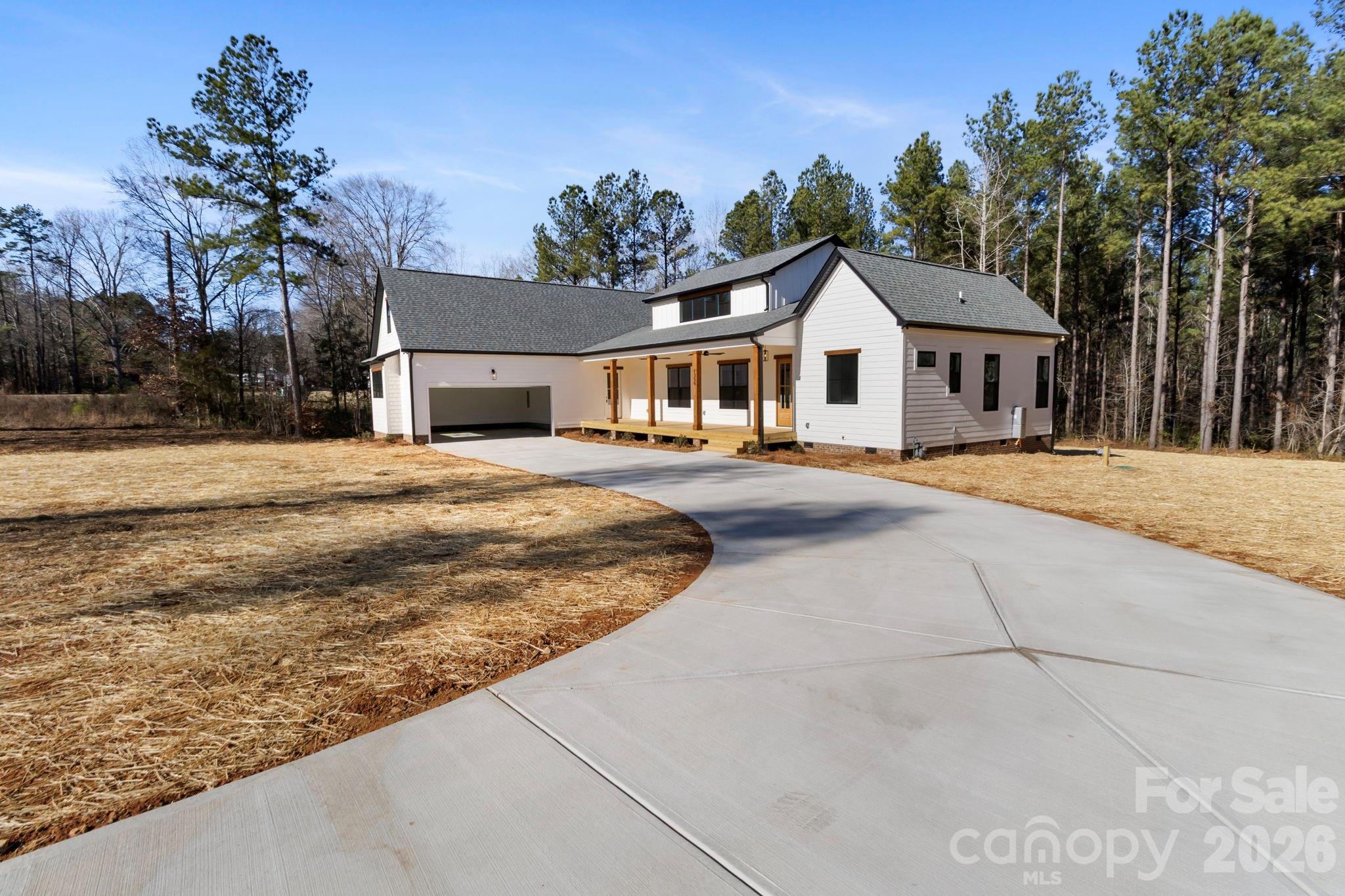 1359 Glasscock Road, Unit 1 Rock Hill, SC 29730 - Photo 1 of 40 a front view of a house with a yard and trees