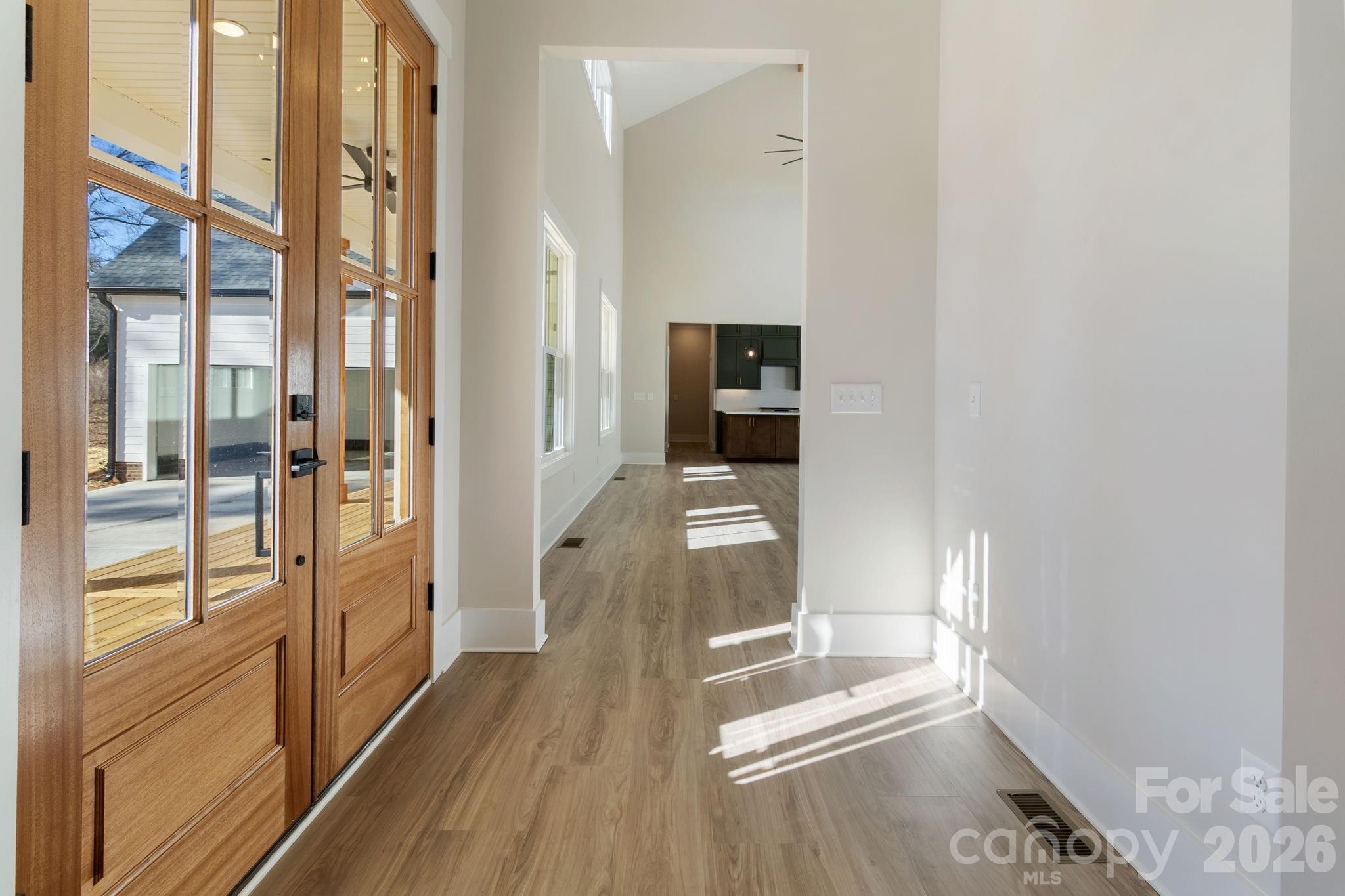 1359 Glasscock Road, Unit 1 Rock Hill, SC 29730 - Photo 15 of 40 a view of a hallway with wooden floor and living room