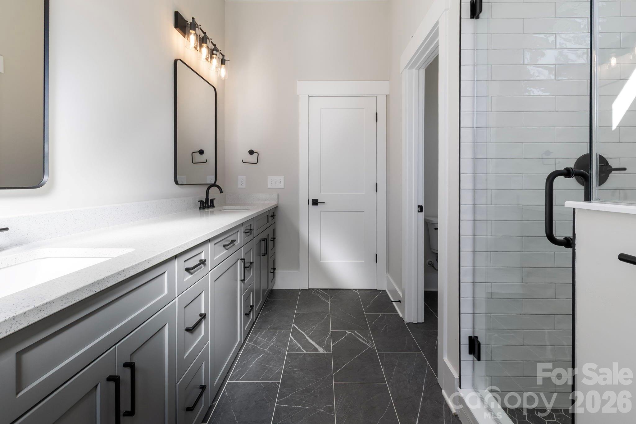 1359 Glasscock Road, Unit 1 Rock Hill, SC 29730 - Photo 16 of 40 a spacious bathroom with a granite countertop shower