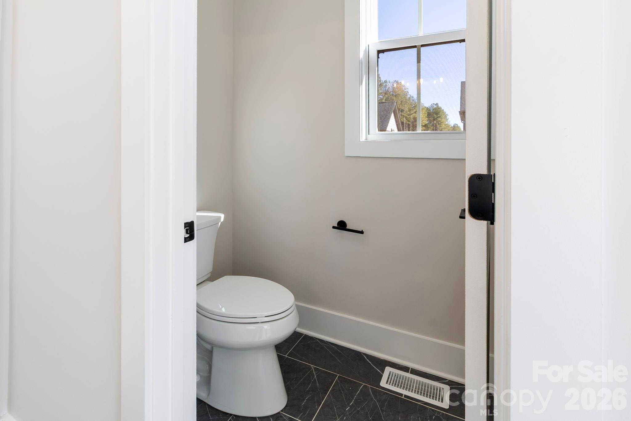 1359 Glasscock Road, Unit 1 Rock Hill, SC 29730 - Photo 22 of 40 a bathroom with a toilet and a sink