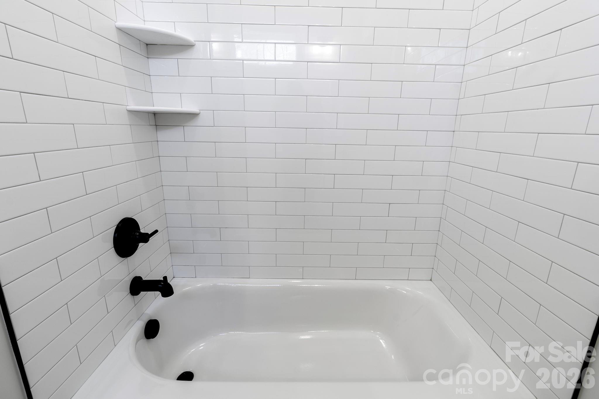 1359 Glasscock Road, Unit 1 Rock Hill, SC 29730 - Photo 28 of 40 a bathroom with a bathtub