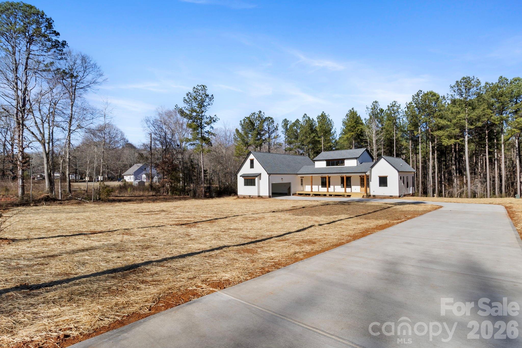 1359 Glasscock Road, Unit 1 Rock Hill, SC 29730 - Photo 35 of 40 a front view of a house with a yard and garage