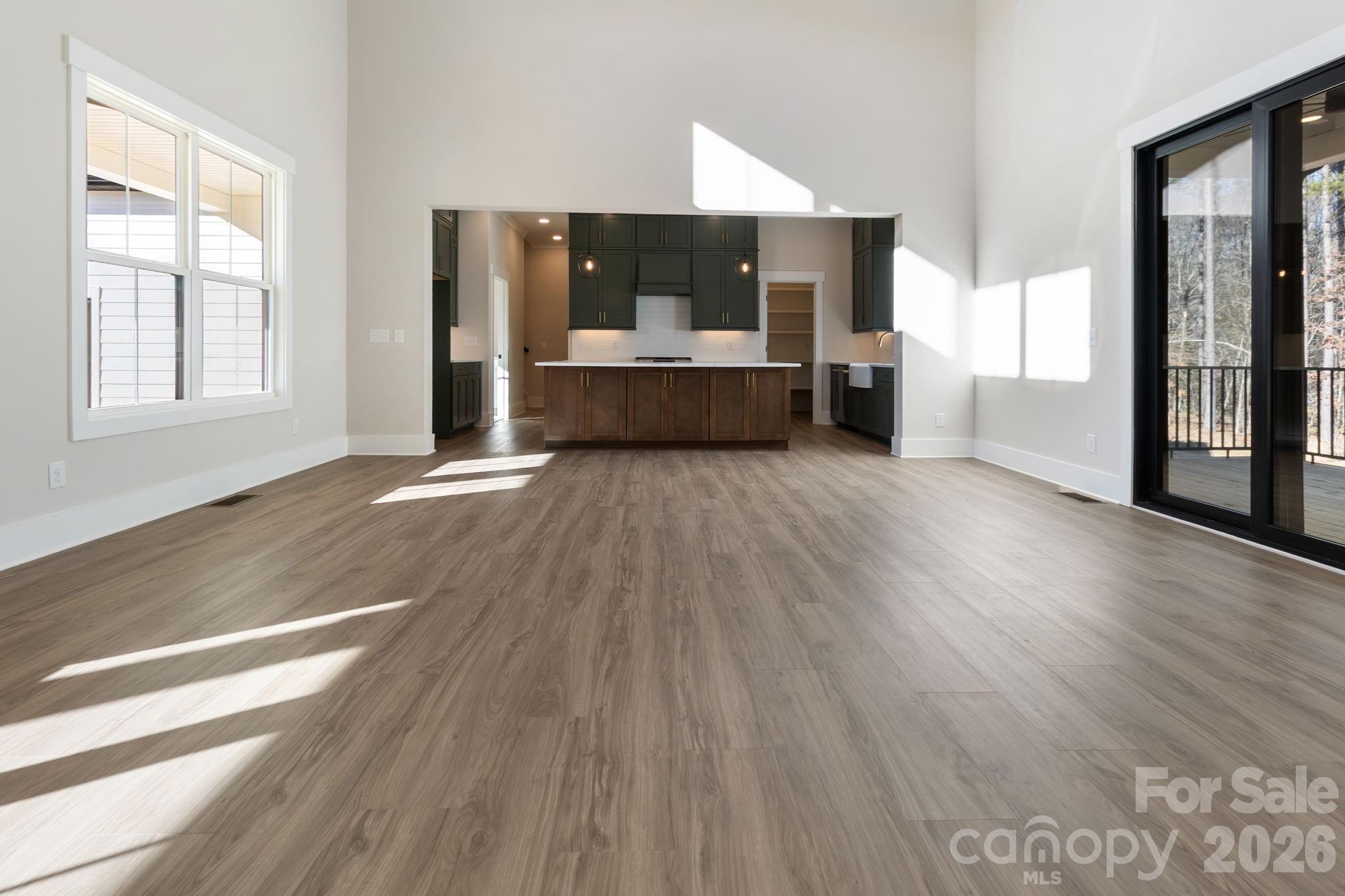 1359 Glasscock Road, Unit 1 Rock Hill, SC 29730 - Photo 10 of 40 a view of a living room with wooden floor and a window