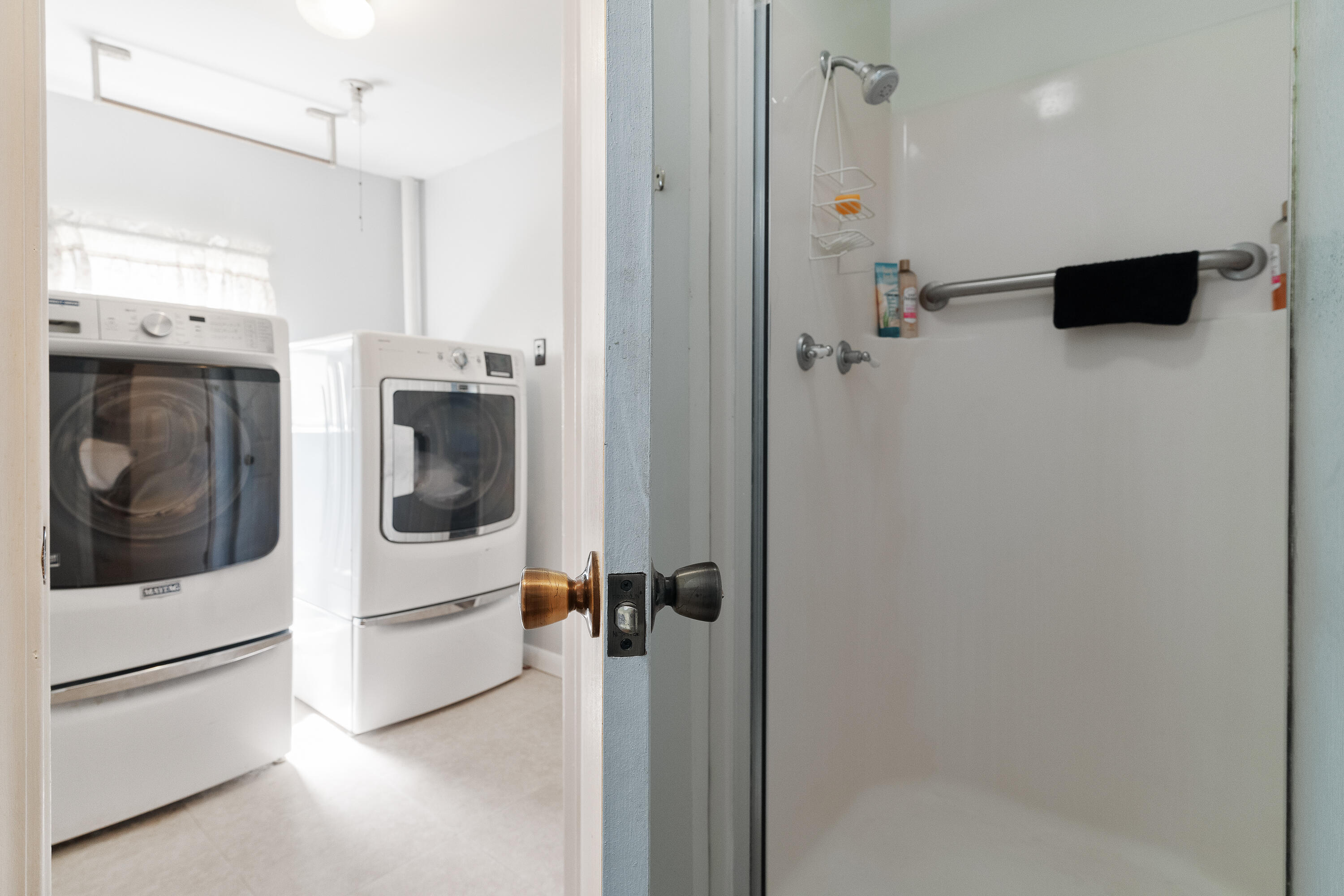 5686 Griffith Cemetery Road Baker, FL 32531 - Photo 27 of 52 a view of a hallway with washer and dryer