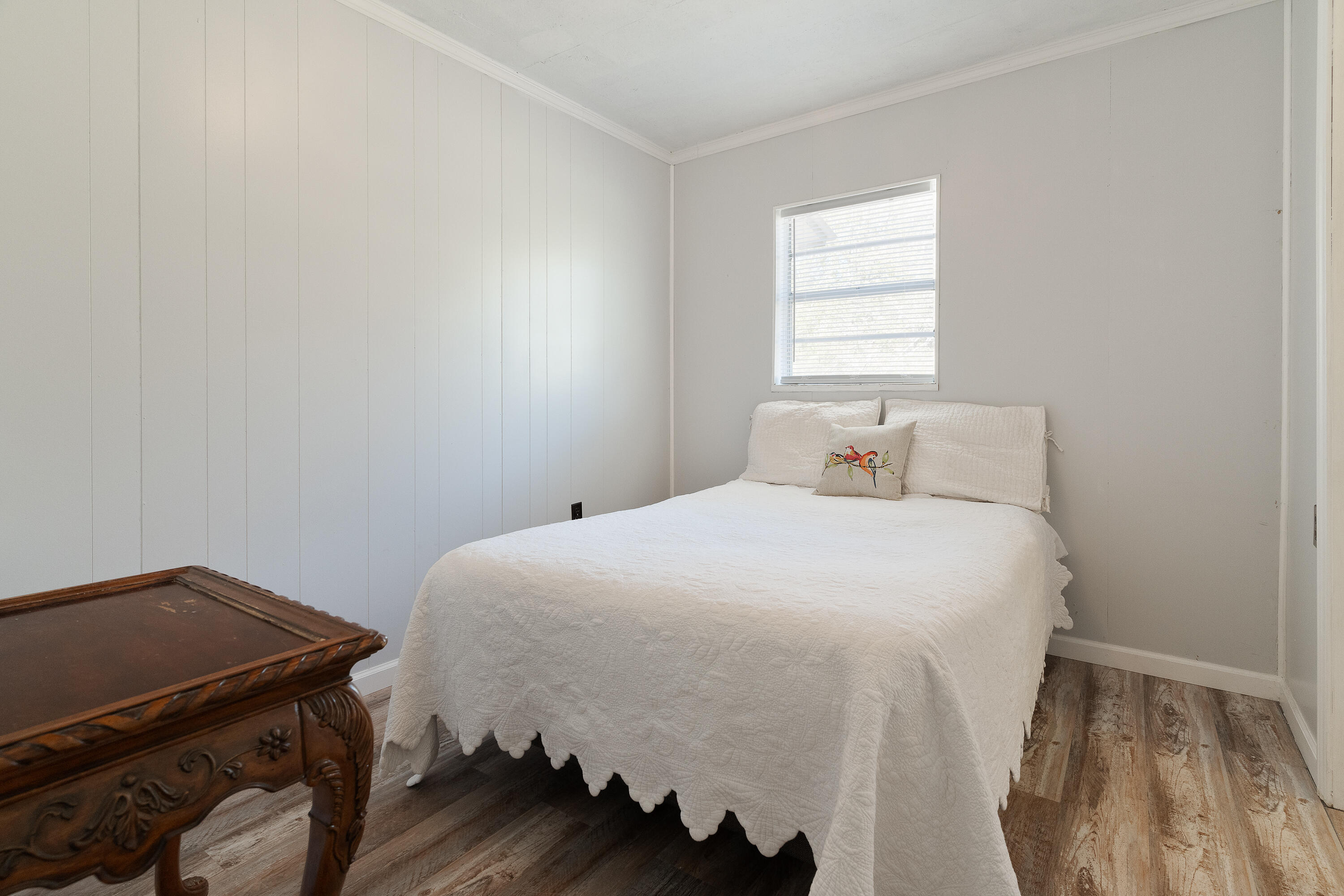 5686 Griffith Cemetery Road Baker, FL 32531 - Photo 35 of 52 a bedroom with a bed and a window