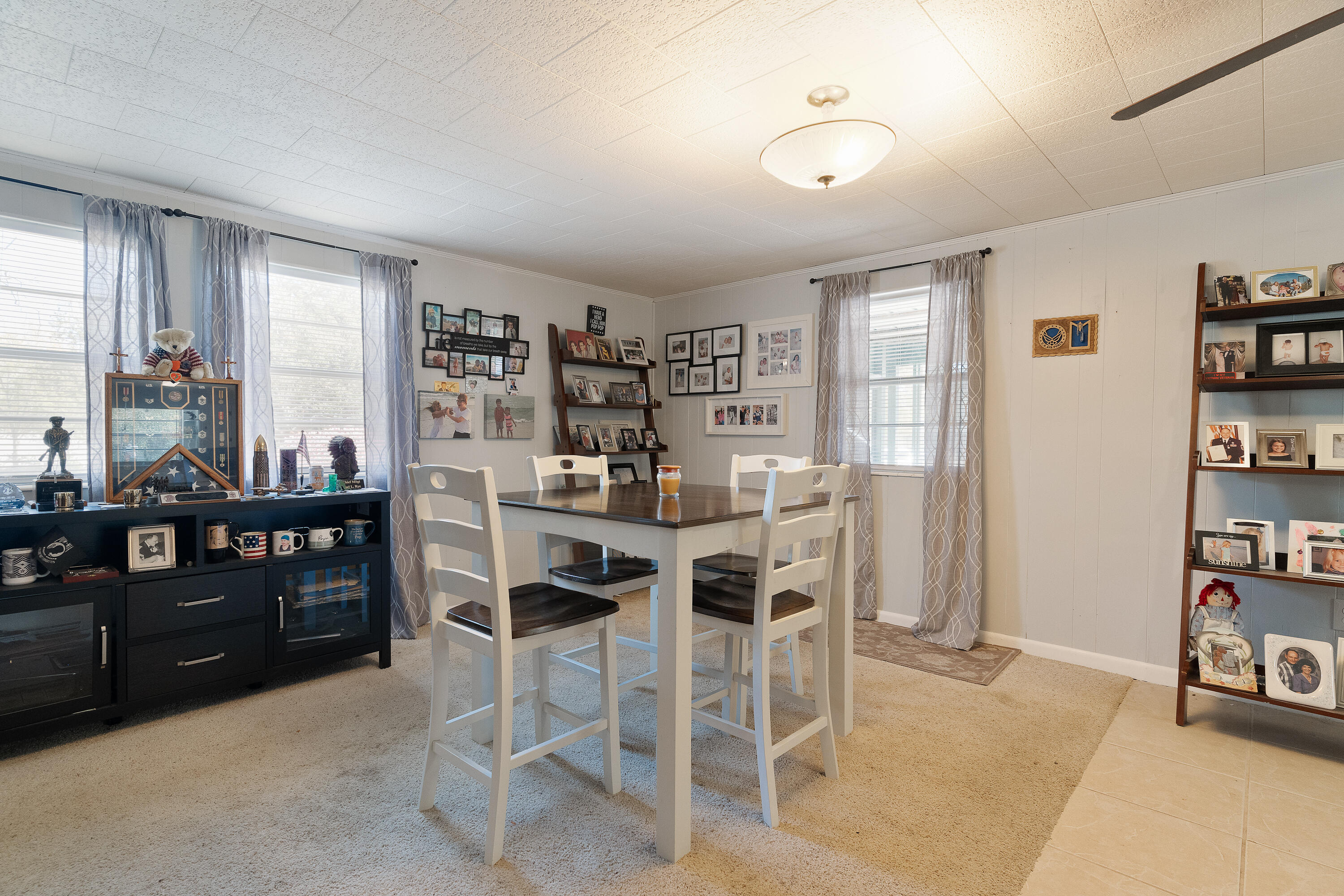 5686 Griffith Cemetery Road Baker, FL 32531 - Photo 10 of 52 a dining room with furniture and window