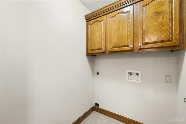 a view of door with washer and dryer