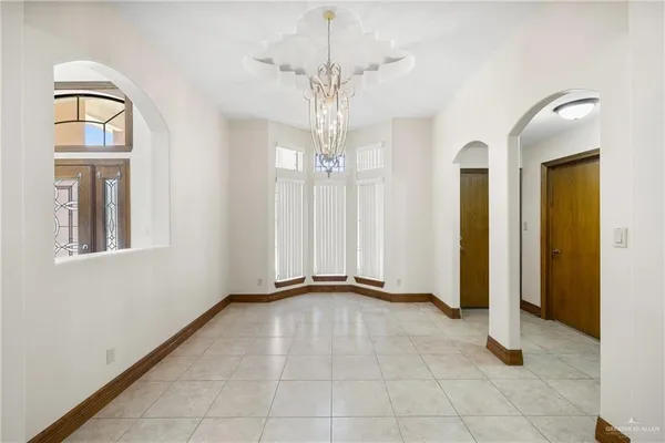 a view of an entryway with front door