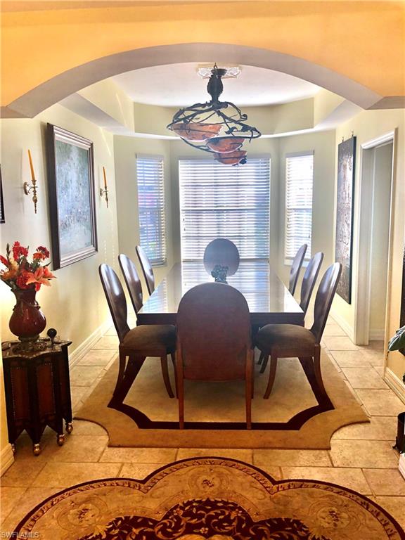 451 Bayfront Place, Unit 5311 Naples, FL 34102 - Photo 23 of 38 a view of a dining room with furniture