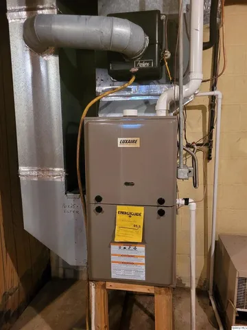 a view of a house with swimming pool in front of it