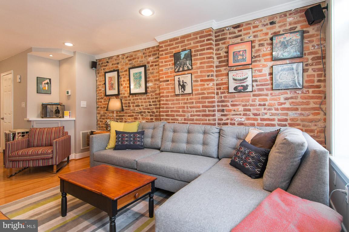512 South Rose Street Baltimore, MD 21224 - Photo 3 of 30 a living room with furniture and a rug