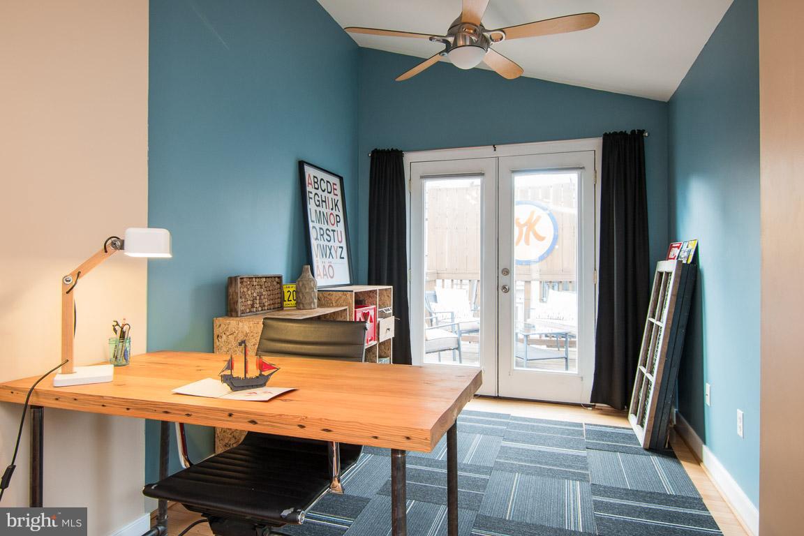 512 South Rose Street Baltimore, MD 21224 - Photo 26 of 30 a view of a dining room with a table and chairs
