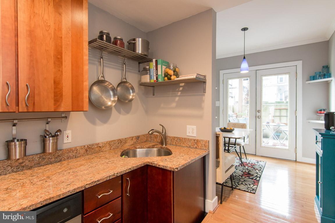 512 South Rose Street Baltimore, MD 21224 - Photo 10 of 30 a kitchen with a sink and cabinets