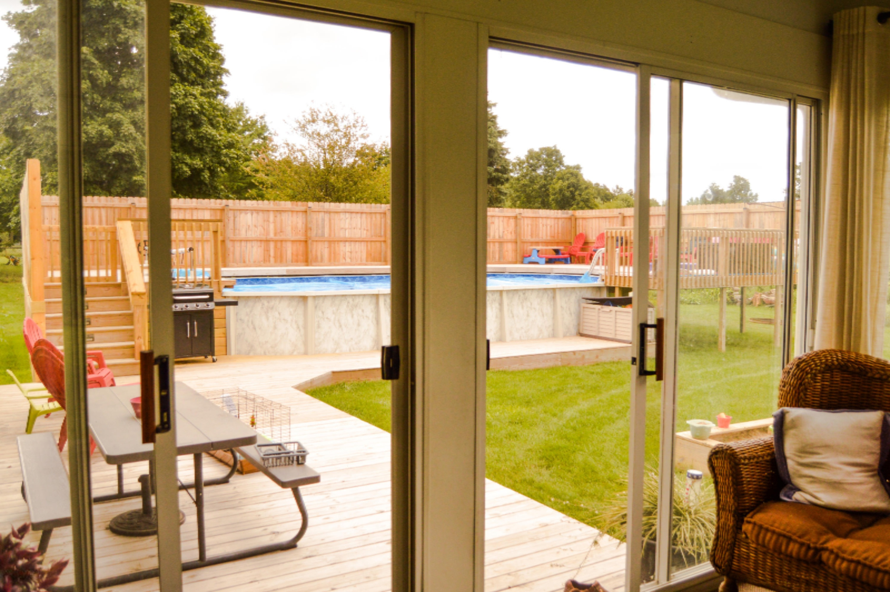 170 10 Mile Road Northwest Sparta, MI 49345 - Photo 24 of 43 view of pool from sunroom