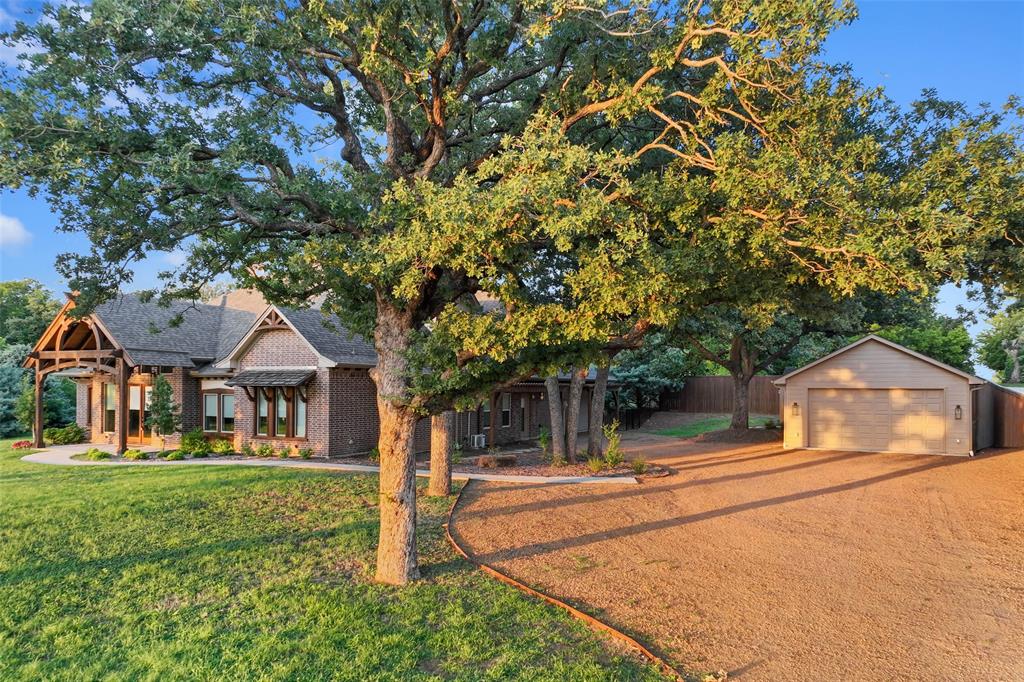 124 Garza Road Shady Shores, TX 76208 - Photo 5 of 40 Oversized parking area, 2 garages and EV outlet