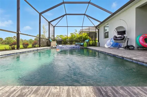 a view of a backyard of a house