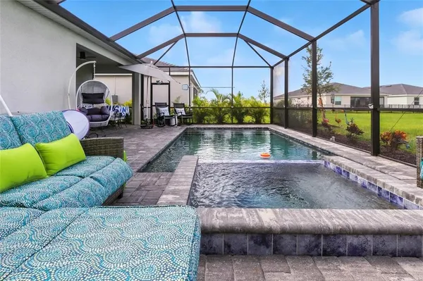 a living room with a couch and a table