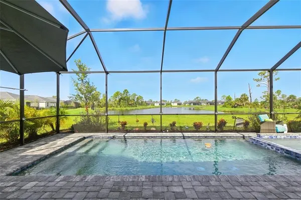 a view of a lake with a park