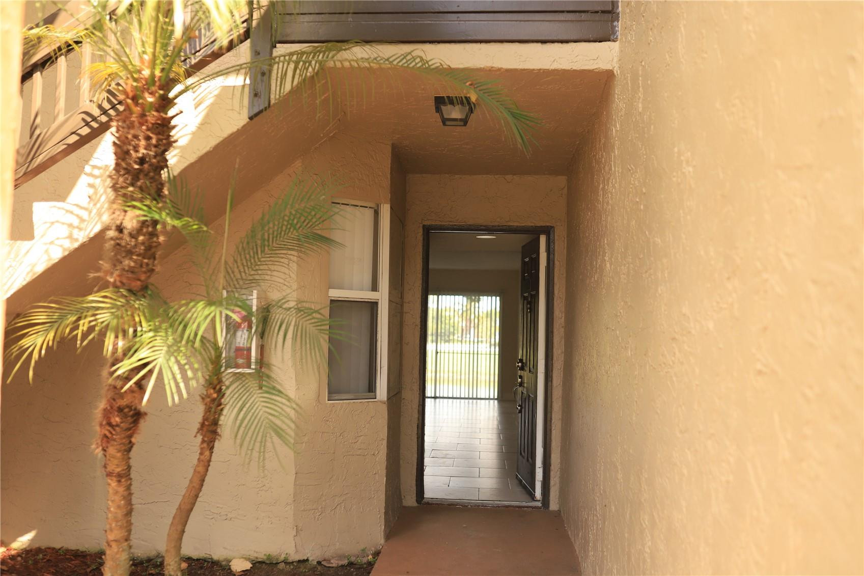 231 Southwest 113th Way, Unit 231 Pembroke Pines, FL 33025 - Photo 1 of 26 a picture of a door
